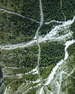 Aerial view of vehicles driving across Passo Gardena road on the Dolomites Mountains, Trentino, South Tyrol, Italy. - AAEF23605