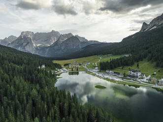 Aerial view of Misurina Lake at sunset with Sorapis mountain in background, Auronzo di Cadore, Dolomites, Veneto, Italy. - AAEF23676