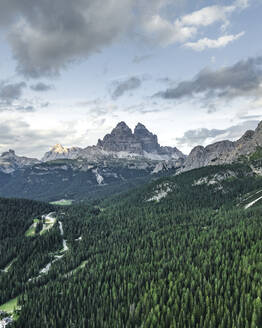 Aerial view of Tre Cime di Lavaredo peaks as seen from Misurina Lake, Auronzo di Cadore, Dolomites, Veneto, Italy. - AAEF23684