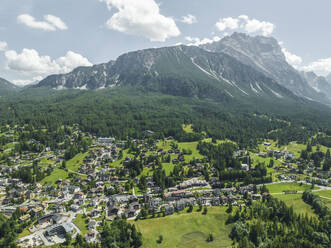 Aerial view of Cortina d'Ampezzo, a small town famous for winter holidays in Belluno province, Dolomites area, Veneto, Italy. - AAEF23690