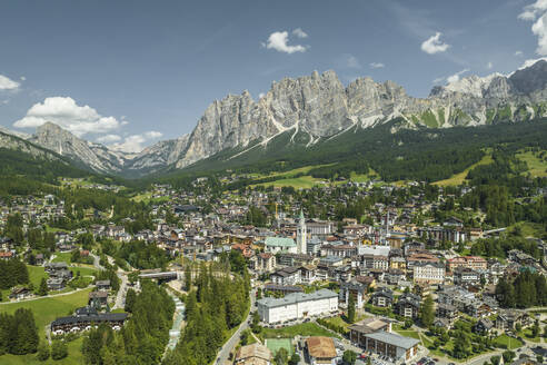 Aerial view of Cortina d'Ampezzo, a small town famous for winter holidays in Belluno province, Dolomites area, Veneto, Italy. - AAEF23691