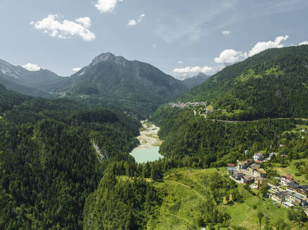 Aerial view of Valle di Cadore Lake, a mountain lake on the Dolomites in Valle di Cadore, Veneto, Belluno, Italy. - AAEF23699