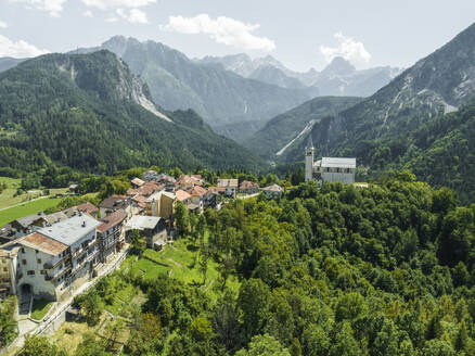 Aerial view of Valle di Cadore, a small town among the mountains on the Dolomites in Veneto, Belluno, Italy. - AAEF23700