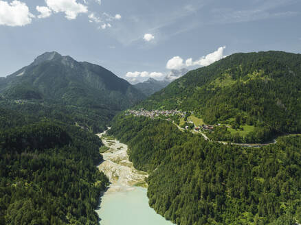 Aerial view of Valle di Cadore Lake, a mountain lake on the Dolomites in Valle di Cadore, Veneto, Belluno, Italy. - AAEF23702