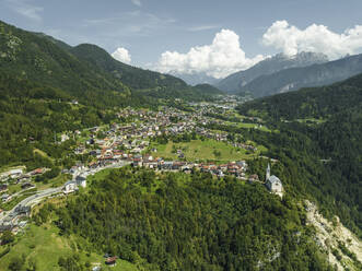 Aerial view of Valle di Cadore, a small town among the mountains on the Dolomites in Veneto, Belluno, Italy. - AAEF23703