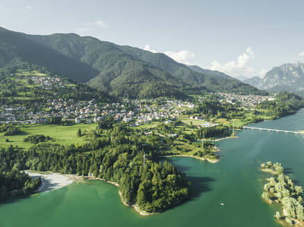 Aerial view of Vallesella, a small town along the Lago di Cadore (Cadore Lake) on the Dolomites mountains, Belluno, Veneto, Italy. - AAEF23711