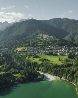 Aerial view of Calalzo di Cadore, a small town along the Lago di Cadore (Cadore Lake) on the Dolomites mountains, Belluno, Veneto, Italy. - AAEF23712