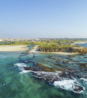 Aerial view of waves over rock formation in the sea, Jisr az-Zarq, Israel. - AAEF23834