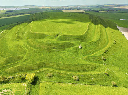 Aerial view of Maiden castle, Dorset, England, United Kingdom. - AAEF23930