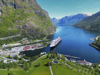 Aerial view of a cruise ship docked in Flam port, Norway. - AAEF23932