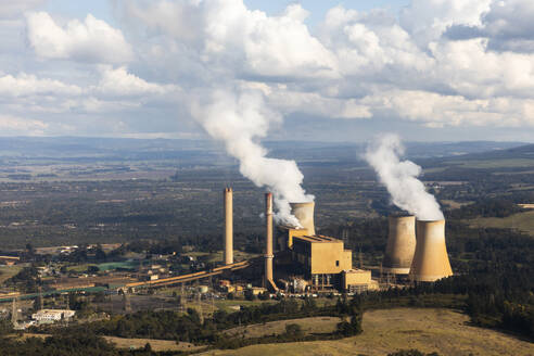 Aerial view of Power Plant Stacks Emitting Billowing Steam, Victoria, Australia. - AAEF23943