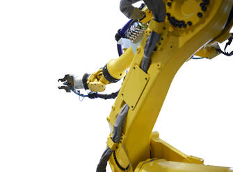 Yellow robotic arm against white background - CVF02687