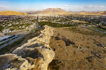 Aerial view of Castle of Van and paramotors, Van, Turkey. - AAEF23955