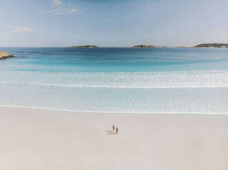 Aerial view of two people walking on Wharton Beach, Esperance, Western Australia. - AAEF24016