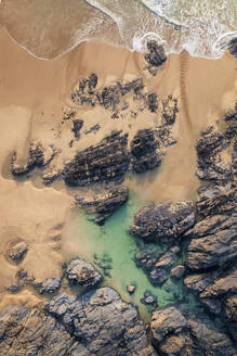 Aerial view of Boobies Bay natural sea pool at low tide, Treyarnon, Cornwall, United Kingdom. - AAEF24061