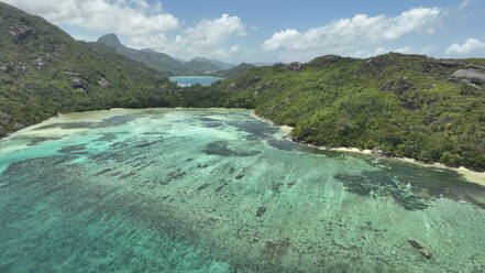 Aerial view of the coral reef in Baie Ternay Marine National Park, Mahé, Seychelles. - AAEF24070