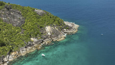 Aerial view of a dive boat in Baie Ternay, Mahé, Seychelles. - AAEF24071