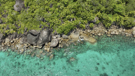 Aerial view of granite boulders in the Baie Ternay Marine National Park, Mahé, Seychelles. - AAEF24075