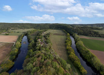 Aerial view of the Village Troglodytique de la Madeleine along the Vezere river in Tursac, Dordogne, France. - AAEF24079