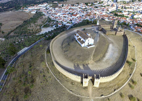 Aerial view of Arraiolos Castle and the Jesus do Passos church in Arraiolos, Evora district, Portugal. - AAEF24143