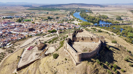 Aerial view of Medellin castle in Badajoz town, Extremadura district, Spain. - AAEF24148