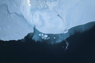 Aerial top-down drone view of an iceberg landscape structure at Ilulissat ice fjord, Greenland, Arctic. - AAEF24188