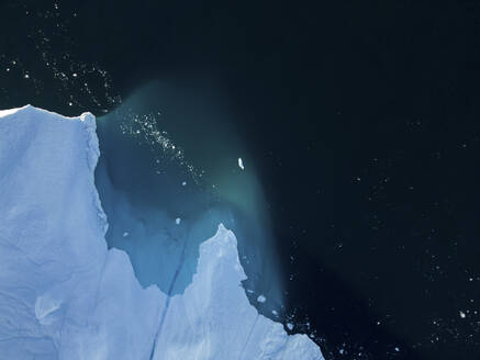 Aerial top-down drone view of an iceberg landscape structure at Ilulissat ice fjord, Greenland, Arctic. - AAEF24193