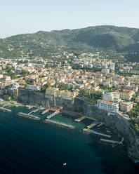 Aerial view of Sorrento, a small town along the coast facing the Mediterranean Sea near Naples, Campania, Italy. - AAEF24241