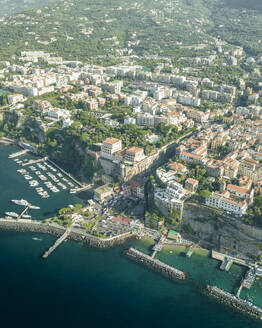 Aerial view of Sorrento, a small town along the coast facing the Mediterranean Sea near Naples, Campania, Italy. - AAEF24246