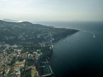 Aerial view of Sorrento, a small town along the coast facing the Mediterranean Sea near Naples, Campania, Italy. - AAEF24250