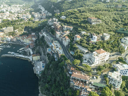 Aerial view of a road following the cliff in Sorrento downtown, a small town along the Mediterranean coastline, Campania, Naples, Italy. - AAEF24259