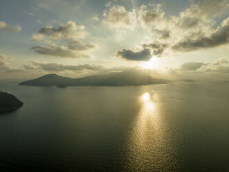 Aerial view of Ischia Island at sunset, a small island on the Flegree archipelagos islands on the Gulf of Naples, Campania, Italy. - AAEF24322