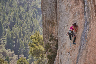 A woman falling while rock climbing in Long Canyon, Moab, Utah Stock Photo  - Alamy