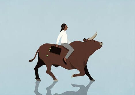 Female investor with money briefcase riding bull market on blue background - FSIF06641