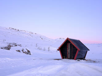 Wind shelter and snow on mountain at sunset - FOLF12566