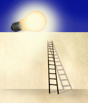 Ladder leading to oversized light bulb lying on top of wall - GWAF00407