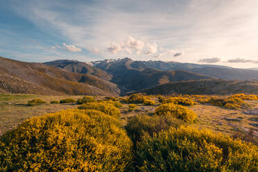 Wide angle of a spring landscape under a sky with clouds, Gredos, Spain - ADSF49179