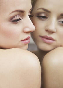 Close up of Woman Face and Mirror Image - FSIF06706