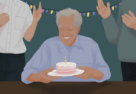 Happy senior man celebrating birthday with clapping friends, preparing to blow out candle - FSIF06759