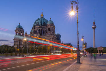 View of Berliner Dom (Berlin Cathedral) and trail lights at dusk, Berlin, Germany, Europe - RHPLF28885