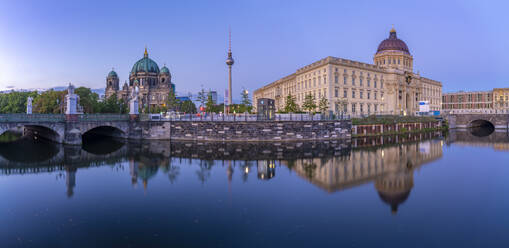 View of Berliner Dom, Berliner Fernsehturm and Humboldt Forum reflecting in River Spree at dusk, Berlin, Germany, Europe - RHPLF28888