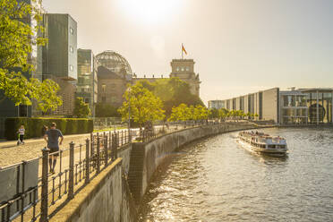 View of sightseeing cruise boat on River Spree and the Reichstag (German Parliament building), Mitte, Berlin, Germany, Europe - RHPLF28922