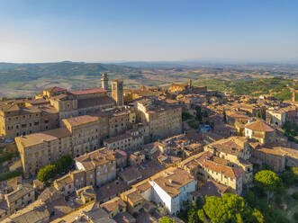 Elevated view of rooftops and town of Montepulciano at sunset, Montepulciano, Tuscany, Italy, Europe - RHPLF28946