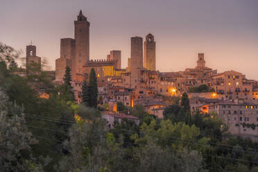 View of San Gimignano skyline at dusk, San Gimignano, UNESCO World Heritage Site, Province of Siena, Tuscany, Italy, Europe - RHPLF29032