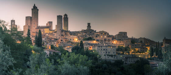 View of San Gimignano skyline at dusk, San Gimignano, UNESCO World Heritage Site, Province of Siena, Tuscany, Italy, Europe - RHPLF29035