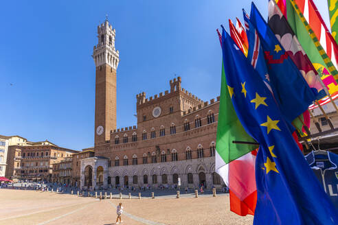 View of flags and Palazzo Pubblico in Piazza del Campo, UNESCO World Heritage Site, Siena, Tuscany, Italy, Europe - RHPLF29037