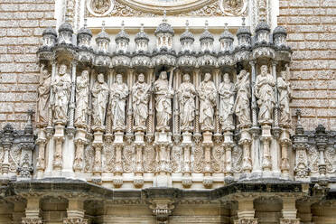 Statues over the church door, Montserrat Monastery, Catalonia, Spain, Europe - RHPLF29202