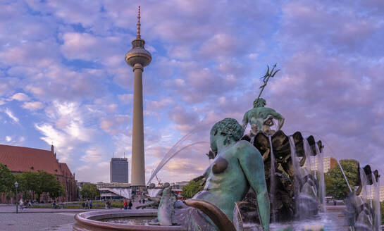 View of Berliner Fernsehturm and Neptunbrunnen fountain at dusk, Panoramastrasse, Berlin, Germany, Europe - RHPLF29253