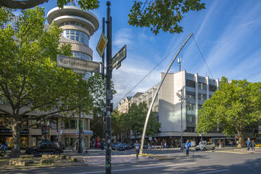 View of shops on the tree lined Kurfurstendam in Berlin, Germany, Europe - RHPLF29261
