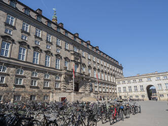 Rows of bicycles outside the Christiansborgs Palace, home of the Danish Parliament, Copenhagen, Denmark, Scandinavia, Europe - RHPLF29283